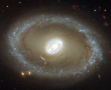 Получен снимок галактики в процессе звездообразования